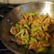 Toss in the celery and chili peppers!