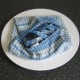 A towel is folded over wraps to keep them in pristine condition.