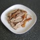 Carved turkey thigh is ready to serve with wraps.