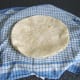 Wraps are heated one by one and kept moist in a warm, damp tea towel.