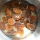 Place apricots in a pan with the water