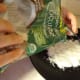 Pour the shredded coconut into a plate in a big circle.
