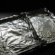 Use foil to make two sections in a large baking pan.