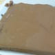Pop into the refrigerator to set, but be sure to cut into squares before it becomes too firm,