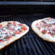 Grill the pizza for 3-4 minutes watching carefully and turning for even grilling.