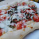 Grilled pizza makes a crisp pizza crust.