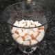 1. Fill the bottom of a trifle bowl with cubed angel food cake.