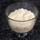 5. Add another layer of cubed cake, sprinkle more Amaretto, and then add layer of pudding.