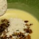 Then slowly begin adding the flour, mixing with the blender on a low setting as you go.
