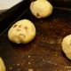 When chilled, with your hands, roll the dough into little balls, about 1-2" round. Bake in oven at 350 for about 15 minutes or until the cakes just start to brown.