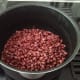 Add drained beans back into the pot.