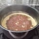 Add chicken granules, oil and seasonings and simmer for 4 hours (covered with vented top)