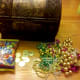 The supplies to make treasure chest cupcakes.