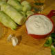You'll need four cucumbers, plain yogurt, white wine vinegar, garlic, lime, dill and half of a green pepper to make cold cucumber soup.