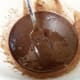 Step 2: Mix with fork until smooth. You can pour this right on the cake for a thin but rich glaze.