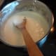 Melt the butter and the marshmallows in a pan.