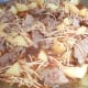 Pour the beef bouillon over the fideo mixture, bring to a boil, cover, and let simmer on low for 10 minutes.