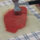 Pound the steak with a tenderizer.