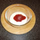 Sauce is poured in to the yoghurt