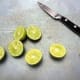 Cut Key limes in half and remove seeds