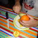 Scoop out the orange insides.