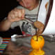 Carefully pour in the cake.