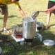 You can use a smaller scoop to stir the pot.