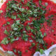 Tomatoes covered in the drained, canned chopped tomatoes and more herbs.