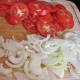 Sliced onions, red bell peppers, tomatoes and bit of bacon.