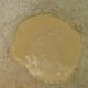 Mixing the crust - milk and eggs in a well in the flour-cheese mixture.