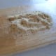 Form four patties and coat the patties with the remainder of the bread crumbs.