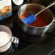 Add the stock and cream; reduce