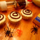 Make 2 circles with chocolate icing.