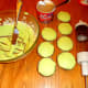 Frost cupcakes with lime green buttercream icing.