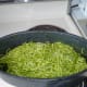 Mix the pesto into drained pasta, in the same pan.