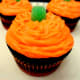Top each cupcake with a green gum drop.