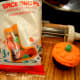 Frost cupcakes with orange icing.