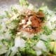 Season with a 1/4 tsp of chili powder and a 1/4 tsp of garlic powder. Add the juice of one lime. Stir and chill until ready to serve.