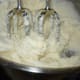 Potatoes can be mashed with a mixer, a hand potato masher or a fork.