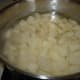 Put potatoes in a pot and cover with water about 3/4" to 1" over potatoes.