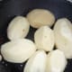 Peeled potatoes. Rinsed & ready to cut.