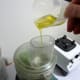 With processor running, slowly add oil