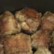 Brown oxtails in hot oil by turning and shifting each piece.