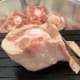 Using a sharp knife, trim any excess fat from the oxtail before seasoning.