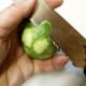 Zest lime by using knife or peeler and cutting off thin pieces of lime peel.