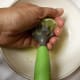 Juice and zest 1 lime. Add the lime juice into the blender with the ice and no-calorie sweetener. Blend until all of the ice is crushed.