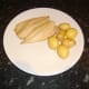 Butter is added to the cooked potatoes