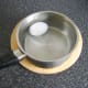 Peeled duck egg is submerged in cold water to cool quickly