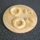 Smaller circles are cut out of toast circles