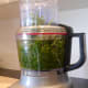 Process until the cilantro is completely shredded.